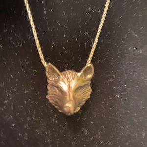 silver wolf’s head necklace